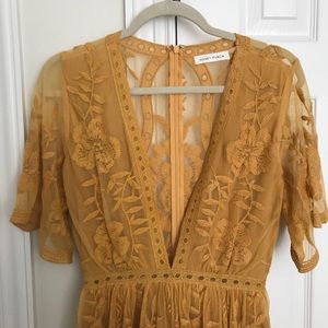 Lace overlay dress with romper.